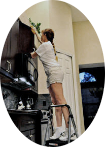 Jami, owner of G & G Commercial Cleaning, cleaning a kitchen